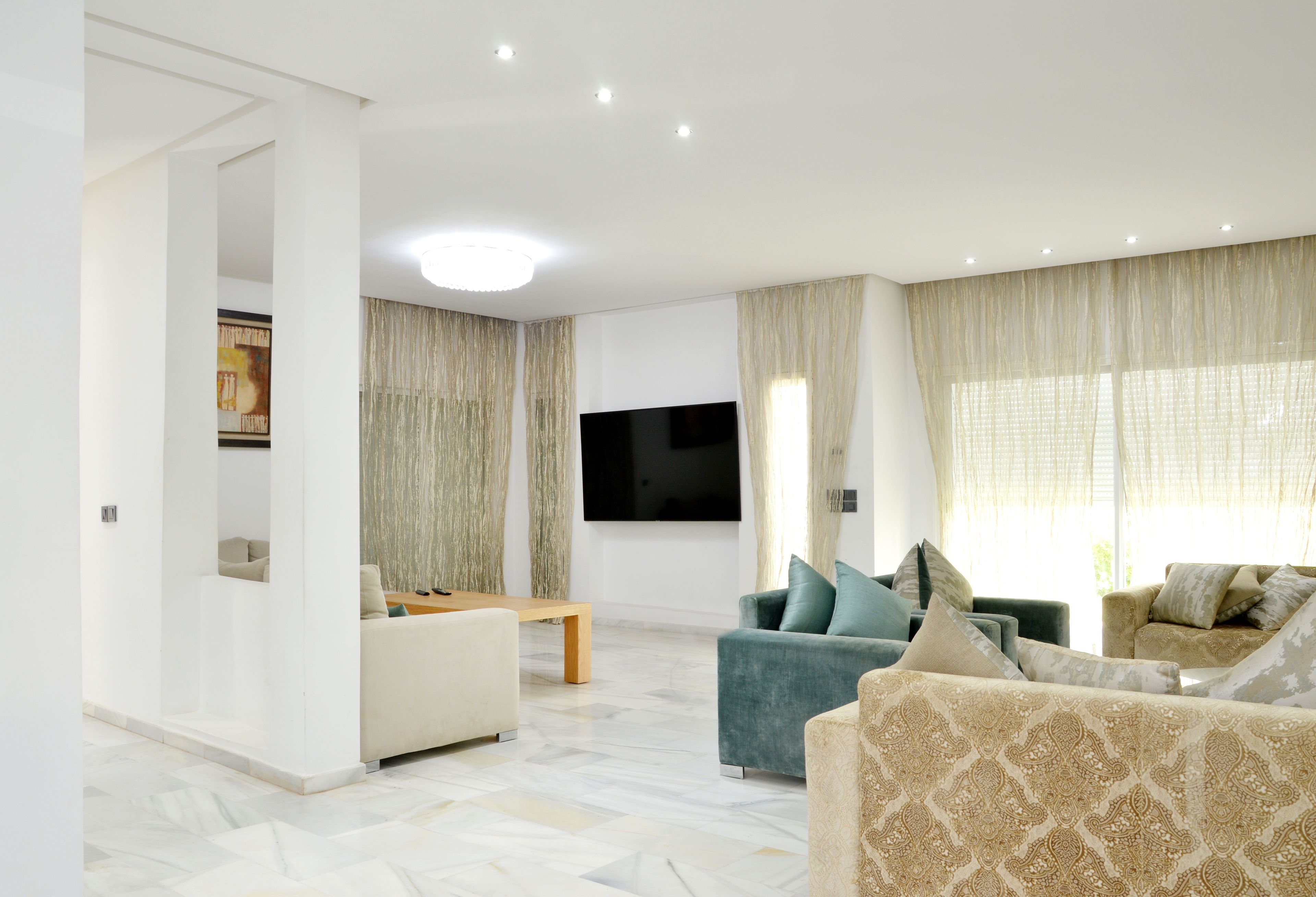 Empty room digitally staged into a warm, furnished living space